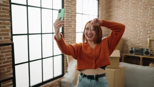 Young Redhead Woman Having Video Call Holding Key New House — Vídeos de Stock