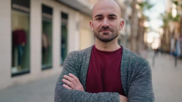 Young Bald Man Standing Serious Expression Arms Crossed Gesture Street — Vídeo de Stock