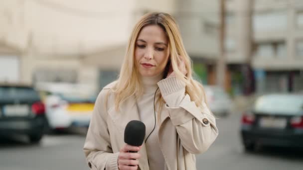Young Blonde Woman Journalist Speaking Using Microphone Street — Stockvideo