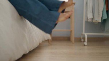 Middle age woman walking at bedroom