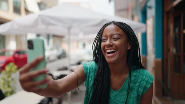 African American Woman Smiling Confident Having Video Call Street — стокове відео