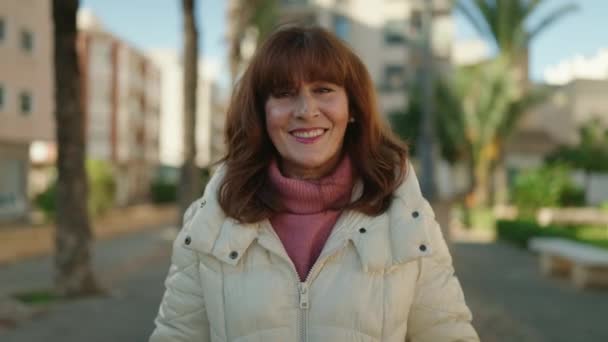 Middle Age Redhead Woman Smiling Confident Walking Street — Vídeos de Stock