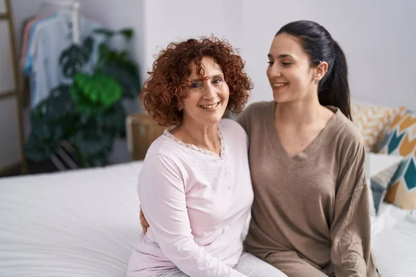 Two Women Mother Daughter Hugging Each Other Sitting Bed — Stockfoto