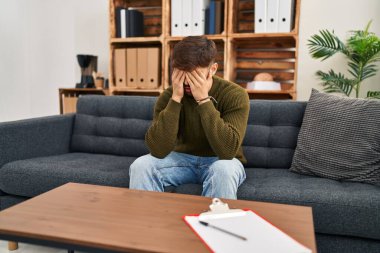 Young arab man patient having mental session at psychology center