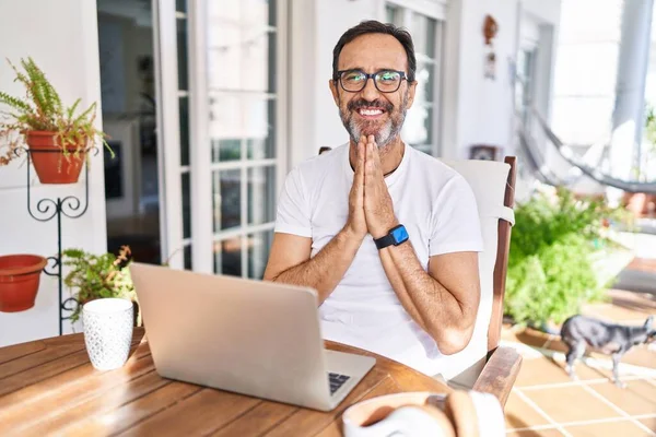 Middle Age Man Using Computer Laptop Home Praying Hands Together — Stock Photo, Image
