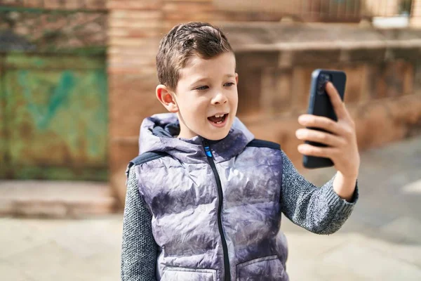 Blond Child Smiling Confident Having Video Call Street — 스톡 사진