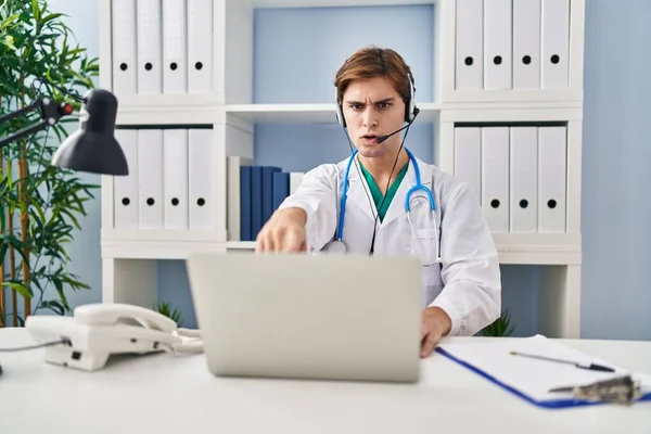Young Doctor Man Working Online Appointment Pointing Finger Camera You — Stock Photo, Image