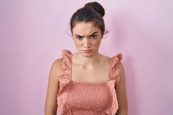 Young Teenager Girl Standing Pink Background Skeptic Nervous Frowning Upset — Stock Photo, Image