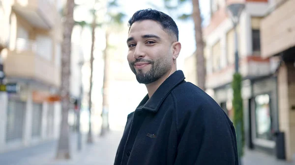 stock image Young arab man smiling confident standing at street