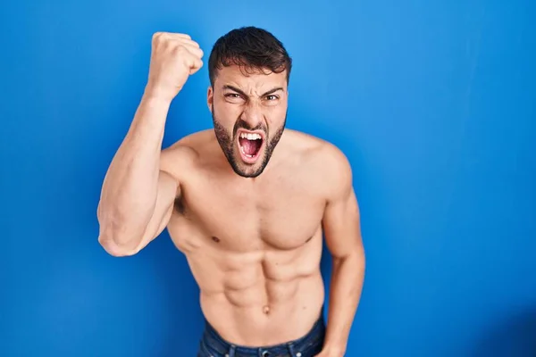 Handsome Hispanic Man Standing Shirtless Angry Mad Raising Fist Frustrated — Stock Photo, Image