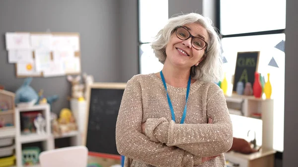 Middle Age Woman Grey Hair Preschool Teacher Smiling Confident Standing — ストック写真