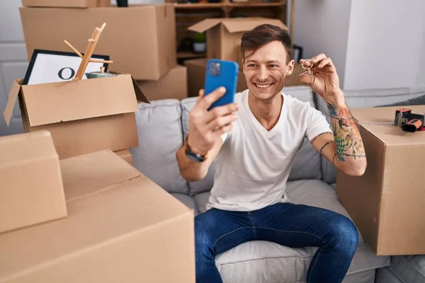 Young Man Having Video Call Holding Key New Home — Stock Photo, Image