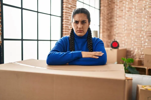 Young Hispanic Woman Moving New Home Skeptic Nervous Frowning Upset — Stok fotoğraf
