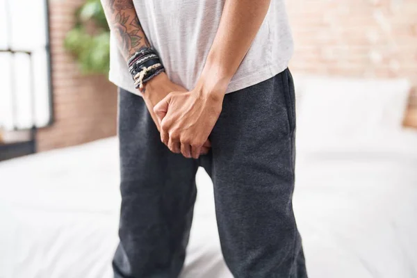 Young Hispanic Man Covering His Genitals Hands Bedroom — Zdjęcie stockowe