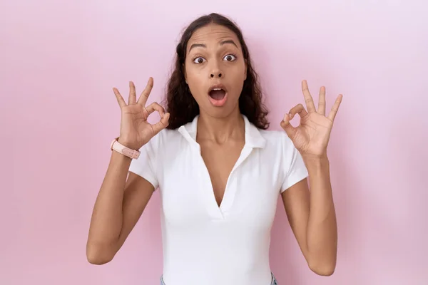 Young Hispanic Woman Wearing Casual White Shirt Looking Surprised Shocked — Stock Photo, Image