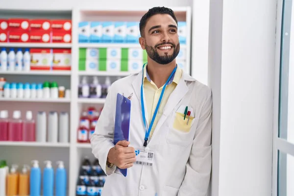 Young Arab Man Pharmacist Smiling Confident Holding Clipboard Pharmacy — Stock Photo, Image