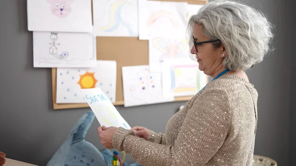 Middle Age Woman Grey Hair Preschool Teacher Looking Draw Kindergarten — Stock Photo, Image