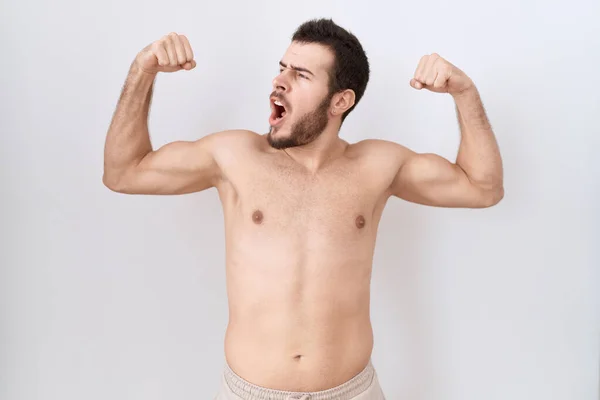 Young Hispanic Man Standing Shirtless White Background Showing Arms Muscles — Stock Photo, Image