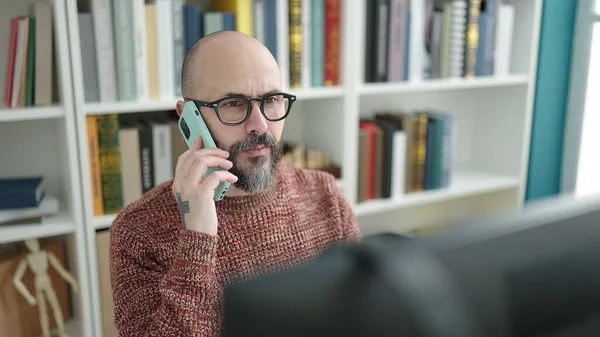 Young Bald Man Student Using Computer Talking Smartphone University Classroom — Stock Photo, Image