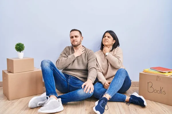 Young Couple Moving New Home Touching Painful Neck Sore Throat — Stock Photo, Image