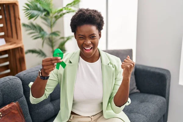 African American Woman Holding Support Green Ribbon Screaming Proud Celebrating — Stock Photo, Image