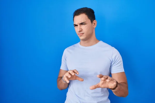 Young Hispanic Man Standing Blue Background Disgusted Expression Displeased Fearful — Foto Stock