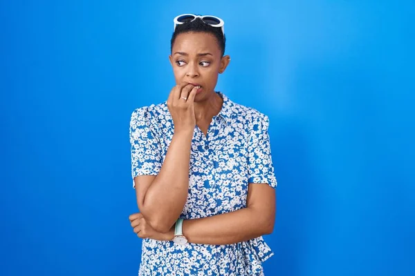 African American Woman Standing Blue Background Looking Stressed Nervous Hands — Foto de Stock