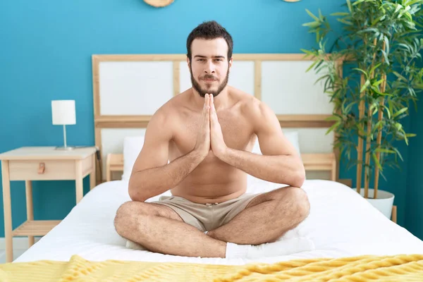 Young Hispanic Man Doing Yoga Exercise Sitting Bed Bedroom — Stock Fotó