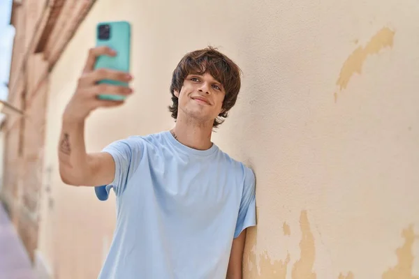Young Blond Man Smiling Confident Making Selfie Smartphone Street — ストック写真