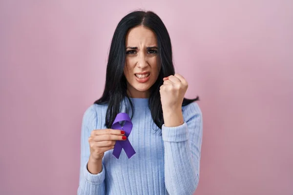 Hispanic Woman Holding Purple Ribbon Awareness Annoyed Frustrated Shouting Anger — Stock Photo, Image