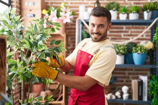 Young Hispanic Man Florist Smiling Confident Cutting Sheet Florist — Stock Photo, Image