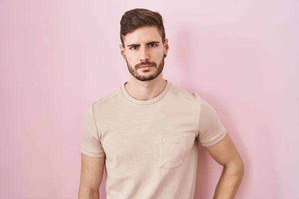 Hispanic Man Beard Standing Pink Background Skeptic Nervous Frowning Upset — Foto de Stock
