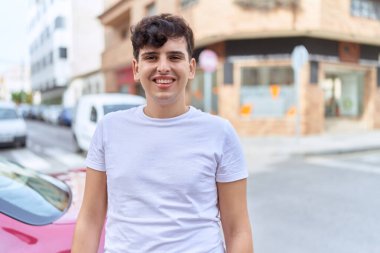 Non binary man smiling confident standing at street
