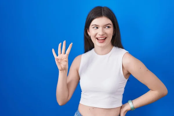Young Caucasian Woman Standing Blue Background Showing Pointing Fingers Number — Foto de Stock