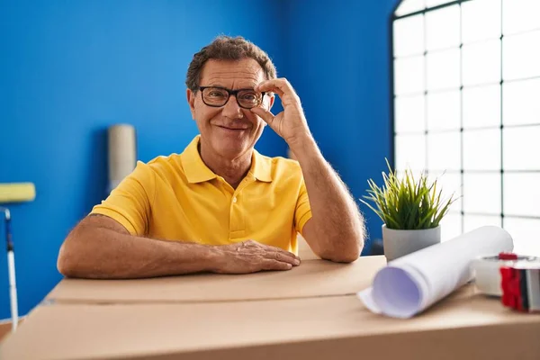 Middle Age Man Smiing Confident Leaning Package New Home — Fotografia de Stock