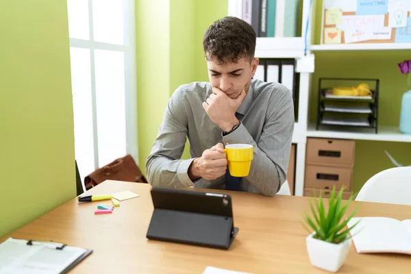 Young Hispanic Man Business Worker Using Touchpad Drinking Coffee Office — Foto Stock