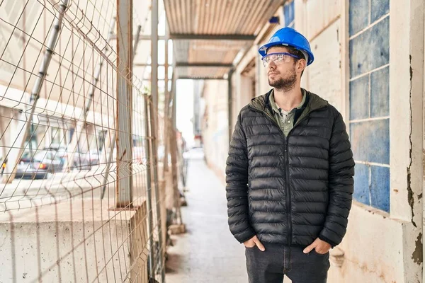 stock image Young man architect smiling confident standing at street