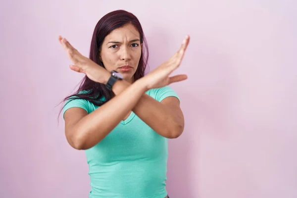 Young Hispanic Woman Standing Pink Background Rejection Expression Crossing Arms — Foto de Stock