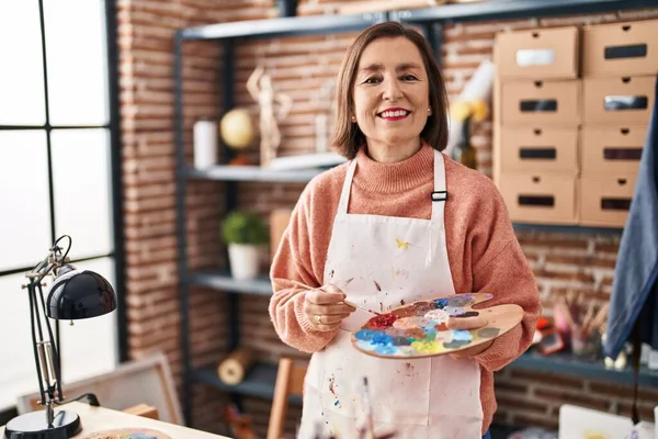 Middle Age Woman Artist Holding Paintbrush Palette Art Studio — Stok fotoğraf