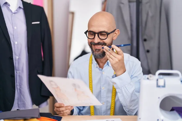 Young Bald Man Tailor Talking Smartphone Looking Clothing Design Tailor — Stock Fotó