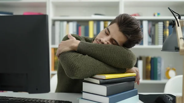 Young Hispanic Man Student Sleeping Head Books Library University — Stockfoto