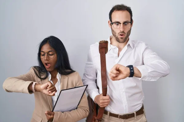Interracial Business Couple Wearing Glasses Looking Watch Time Worried Afraid — Stock Photo, Image