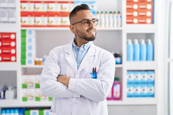 Young Hispanic Man Pharmacist Smiling Confident Standing Arms Crossed Gesture — Foto Stock