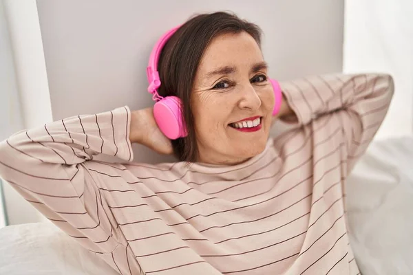 Middle Age Woman Listening Music Sitting Bed Bedroom — Foto Stock