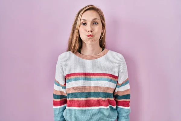 Young Blonde Woman Standing Pink Background Puffing Cheeks Funny Face —  Fotos de Stock