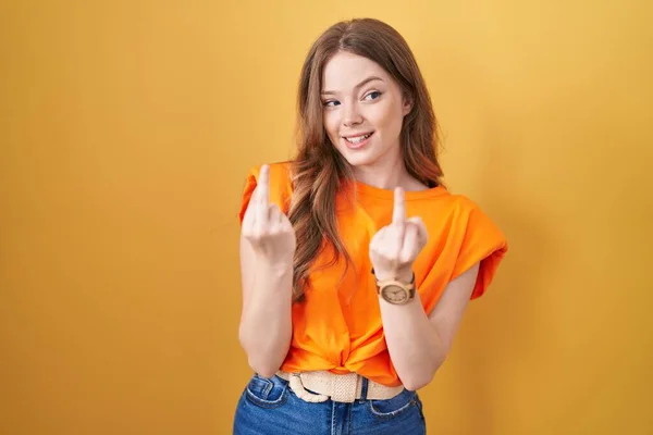 Caucasian Woman Standing Yellow Background Showing Middle Finger Doing Fuck — Stockfoto