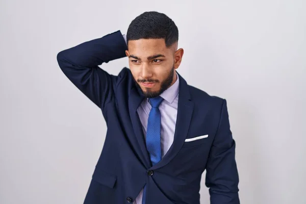 Young Hispanic Man Wearing Business Suit Tie Confuse Wondering Question — Fotografia de Stock