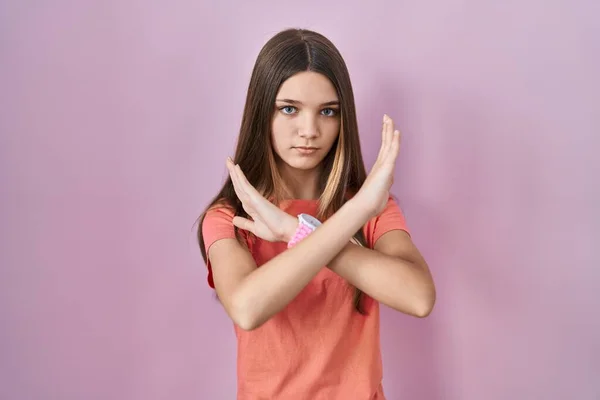 Teenager Girl Standing Pink Background Rejection Expression Crossing Arms Doing — Stock Photo, Image