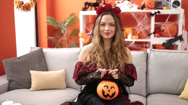 Young Beautiful Hispanic Woman Wearing Katrina Costume Holding Halloween Pumpkin — 图库照片