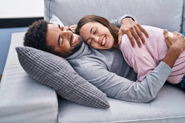 Man Woman Couple Hugging Each Other Lying Sofa Home — Stockfoto